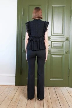 Stella Nova Sleeveless Blouse With Flounce - Black 7 Stella Nova Sleeveless Blouse With Flounce - Black -Lulu&M Sleeveless blouse with flounce Top CD35 1620 999 Black 1 1200x jpg