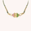 Mya Bay Large Woven Beaded Necklace - Fuchsia / Green 1 Mya Bay Large Woven Beaded Necklace - Fuchsia / Green -Lulu&M pub media mercator photo import CO 272 C BIGTALISMANFUCHSIAGREEN big nude web